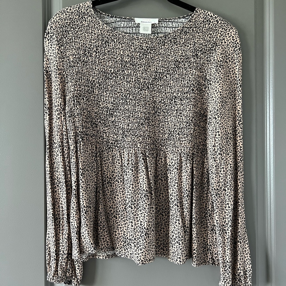 super cute business causal cheetah blouse, lightly worn